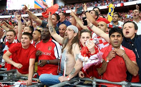 Arsene Wenger Forced To Go Topless After Arsenal Team Soak Him In Beer Following Thrilling Fa