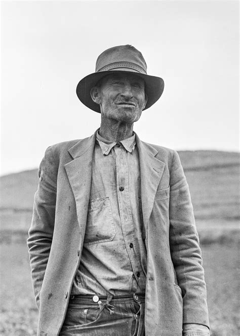 Grayscale Portrait Of A Man In Suit Jacket And Panama Hat · Free Stock