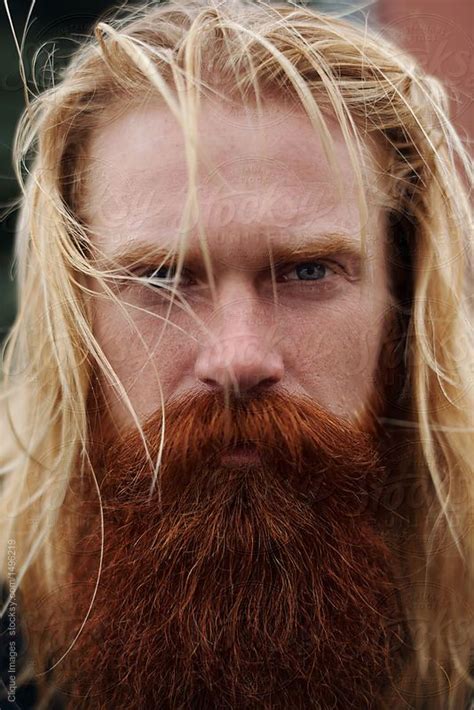 Portrait Of Handsome Nordic Man Portrait Of Serious Middle Aged Man With Long Blond Hair Red
