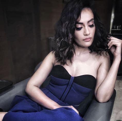 Surbhi jyoti naagin 3 hot backless show hd navel caps. Surbhi Jyoti Hot Navel New HQ Pics Images In Short Clothes