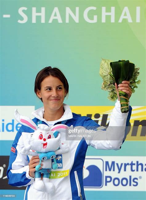 Bronze Medalist Italys Tania Cagnotto Waves From The Podium During