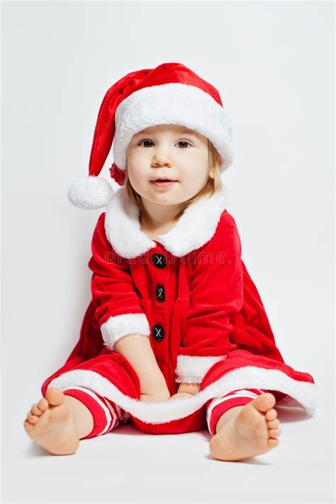 Christmas Child In Santa Hat Opening Xmas T Box Stock Image Image