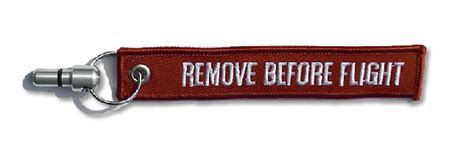 Remove before flight dark red key chain aviation atv motorcycle pilot crew tag. Remove Before Flight