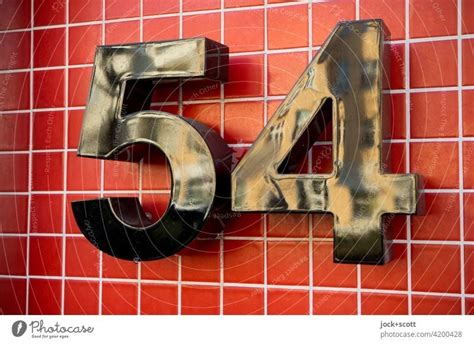 Black Number 54 On Red Tiles A Royalty Free Stock Photo From Photocase