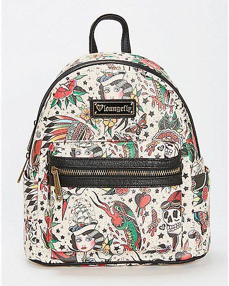 A hiking tattoo, be it a compass, pair of boots, map, or panoramic view of the mountains, accompanies you like a protective emblem wherever you go. Loungefly Tattoo Mini Backpack - Spencer's | Mini backpack ...
