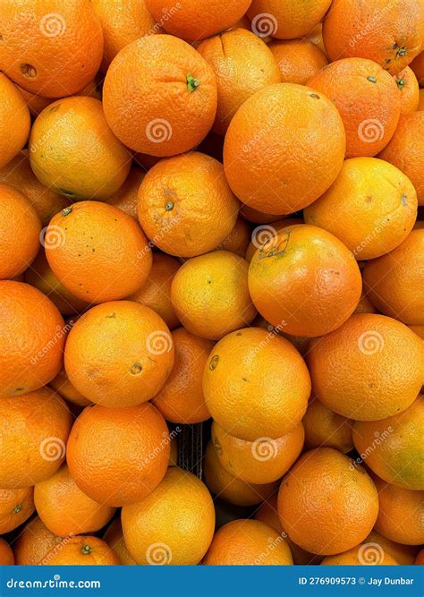 Vibrant Navel Oranges Are Organic And Fresh Picked In A Box Stock Image