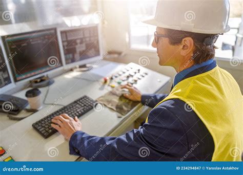 Male Worker Using Computers At Manufacturing Plant Stock Image Image