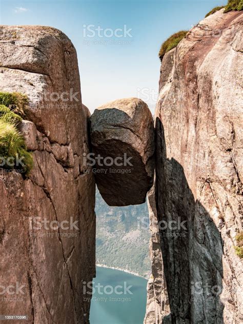 Kjeragbolten The Stone Stuck Between Two Rocks Stock Photo Download