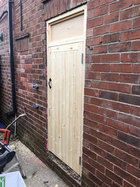 Bespoke External Wooden Door For External Storage Designed And Fitted By