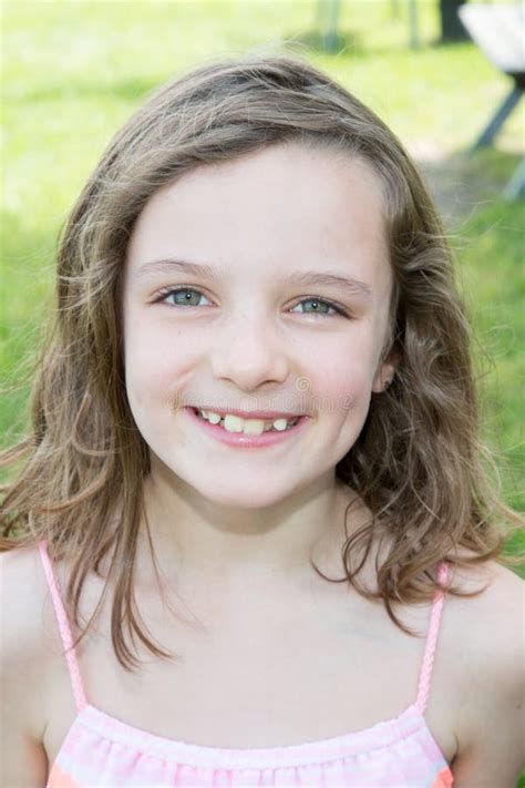 Beautiful Little Girl Happy Smiling On Studio And Isolated In White