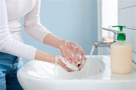 Premium Photo Washing Your Hands Often With Water And Soap