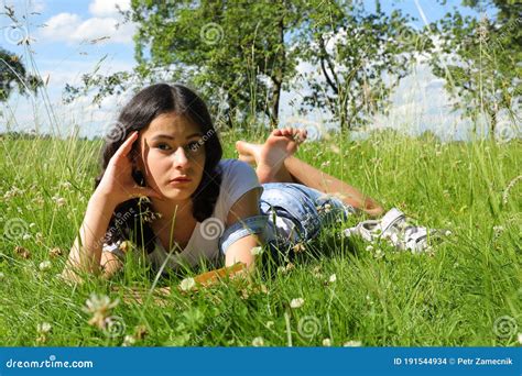 Teenage Schoolgirl Lying In Grass Stock Photo Image Of Grass