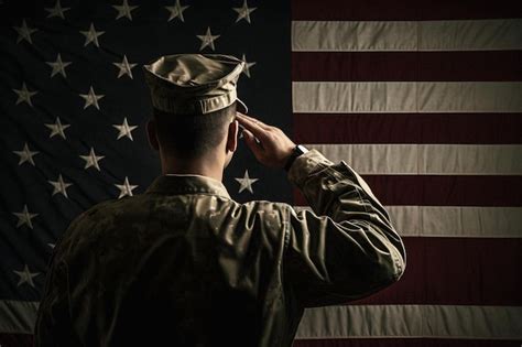 Premium Photo A Soldier Salutes The Flag Of The United States Of America