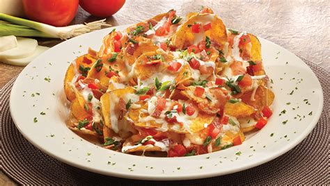 Designed at cineplex digital networks. Boston's | Menú entradas