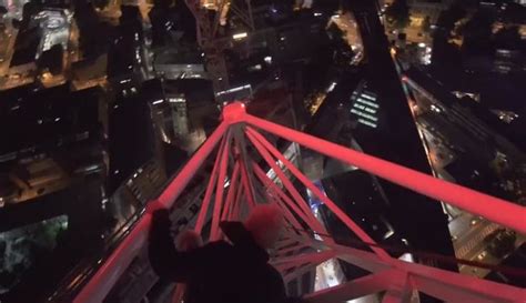 teenage daredevil films himself risking life as he climbs 400 ft crane in london mirror online