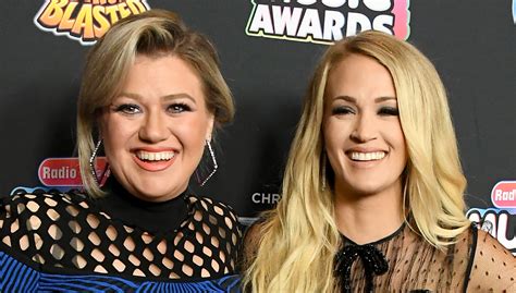 Kelly Clarkson And Carrie Underwood Both Dropped Christmas Songs Today Listen Now Carrie