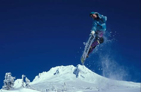Man Snowboarding During Daytime · Free Stock Photo