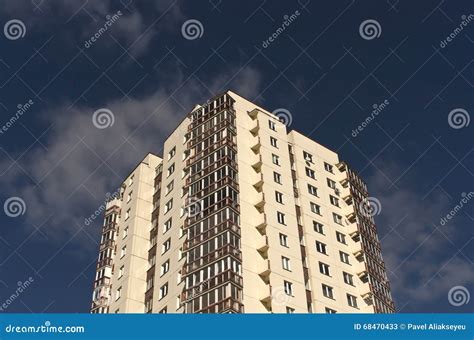 Modern Residential Building Against Blue Sky With Clouds Stock Image