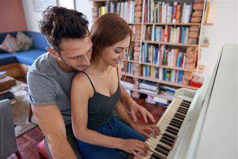 Young Couple Playing The Piano Stock Image Everypixel