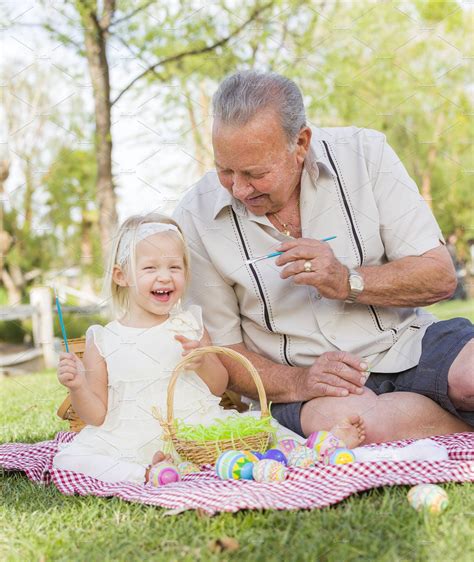 Grandpa And Granddaughter On Easter Containing Man Male And Love Granddaughter Picnic