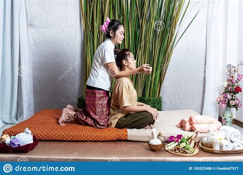 Thai Masseuse Doing Massage For Lifestyle Woman In Spa Salon Asian