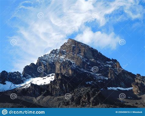 Landscape Of The Snowy Peak Of Mount Kenya Under Sunlight With Cloudy