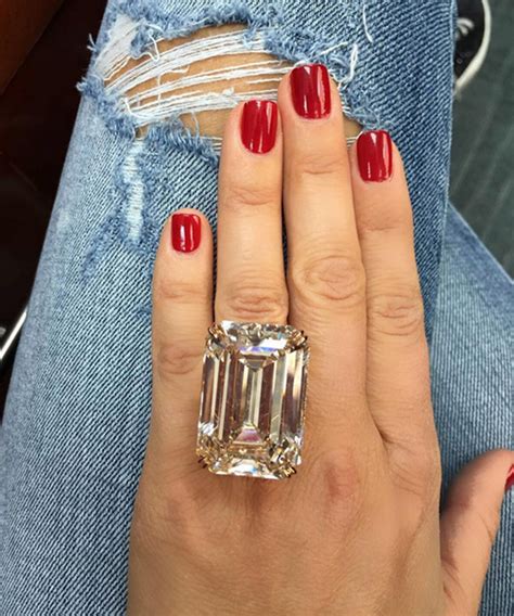 An engagement ring and wedding band receive less wear than if worn on the dominant hand. Would you wear an 80 Carat diamond engagement ring?