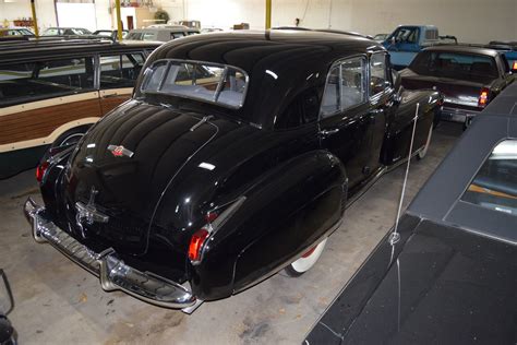 The auxiliary (jump) seats that unfolded from the imperial division accommodated three additional passengers, for a total of nine. 1941 Cadillac Fleetwood 60S | Orlando Classic Cars