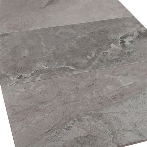The glazed surfaces are like glass and are best used on instead of trying to figure out if a tile is or is not porcelain, just look for the size, pattern, price and natural stone tile on the other hand is somewhat different than porcelain and ceramic. Prisma Gris Ceramic Tile | Stone look tile, Tiles ...