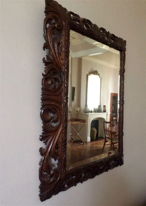Maybe you would like to learn more about one of these? Miroir en bois sculpté vintage - Luckyfind