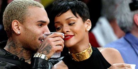 Rihanna And Chris Brown Get Cozy At Lakers Game