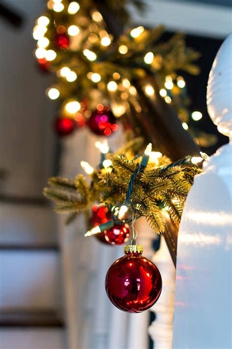 Place it under the garland and banister wrapping it around and. Decorating Garland with Ornaments