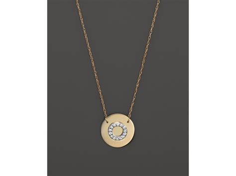 The 14k white gold pendant sways from a cable chain that adjusts from 16 to 18 inches and secures with a lobster clasp. Jane basch 14k Yellow Gold Circle Disc Pendant Necklace ...