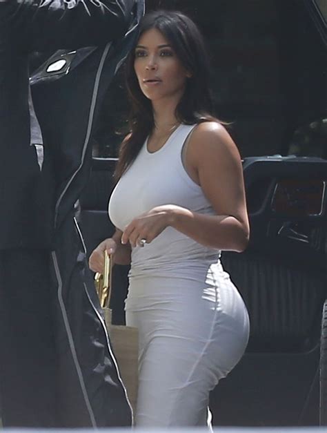 Kim Kardashian Flaunts Famous Kurves In Skintight Dress Before Posting