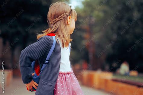 Little Girl Wearing A Backpack Going Back To School Cute And Adorable