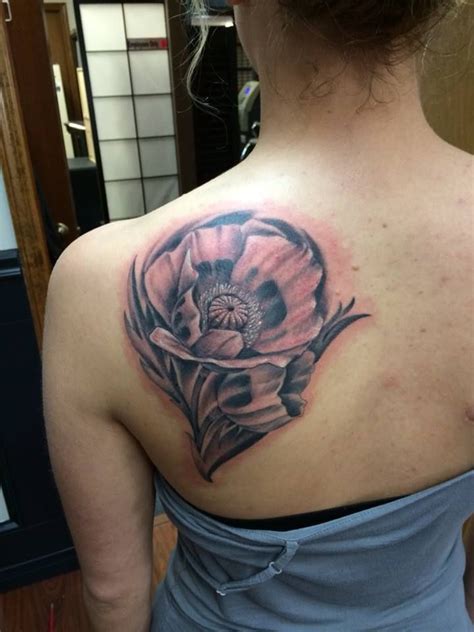 Black and gray poppy tattoo by Josh Ludlow at Rogue Tattoo in Medford