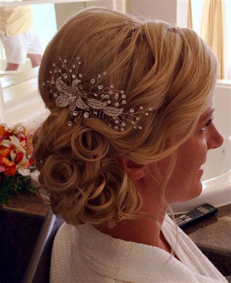 One more wedding hairstyle side bun to steal your heart. Wedding hair elegant messy side bun updo | Bridal hair ...