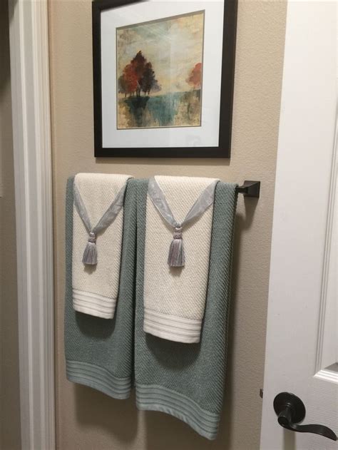 Basically, the idea is folding one of our existing hand towels to construct an attached pocket, then fill the pocket with, well, whatever you want. 96 best Decorative Towels images on Pinterest | Bathroom ...