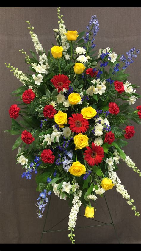Depending on their color, they might suggest love, friendship, maternal affection, hope for renewed life and even determination to keep living in the face of death. A beautiful standing spray full of color. Yellow roses ...