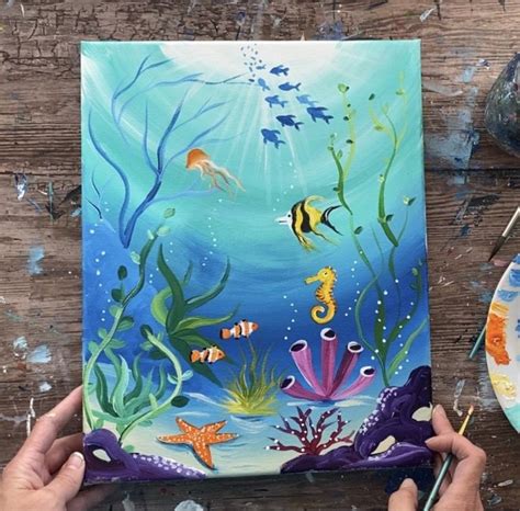 Someone Is Painting An Underwater Scene With Acrylic Paint