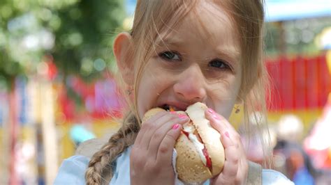 Lovely Young Person Enjoying Snack In Park Stock Footage Sbv 324023939