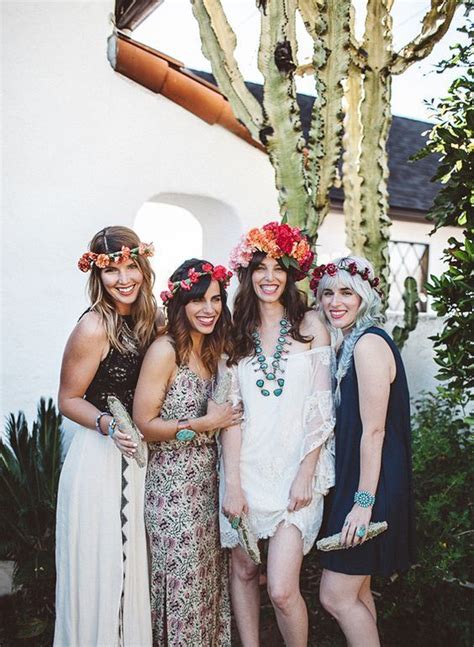 Four Women In Flower Crowns Pose For A Photo