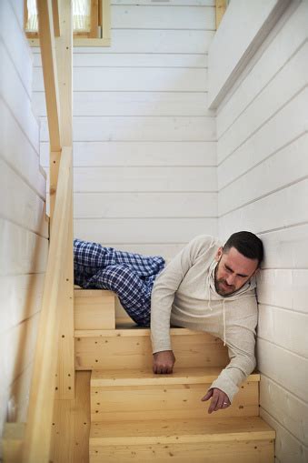 Man Falling Down Stairs Stock Photo - Download Image Now - iStock