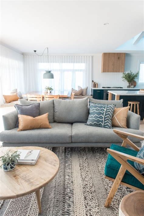 'the color palette and materials that are chosen can also have a huge impact on the overall design,' says simon tcherniak, senior designer at neville johnson. 31 Minimalist Mid-century Living Room with Grey Sofa | Living room grey, Living room designs ...