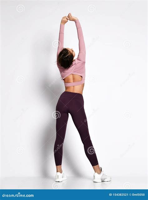 Athletic Woman Sporty Girl In Fashion Sportswear Clothes Stands Posing After Workout Exercises