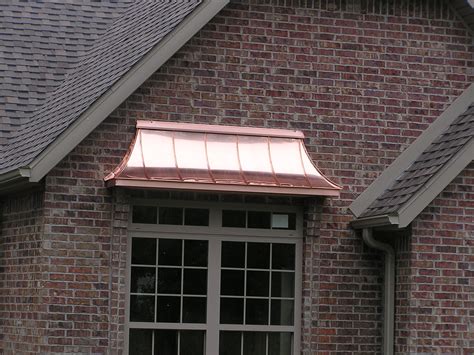 The Uptown Acorn The Acorn Cottage Copper Awning Woven Shades