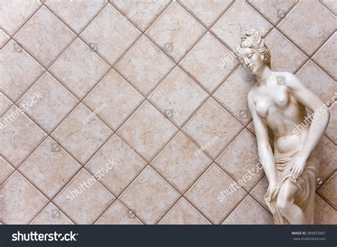 Statue Nude Woman Against Travertine Tiles Stock Photo 389053987