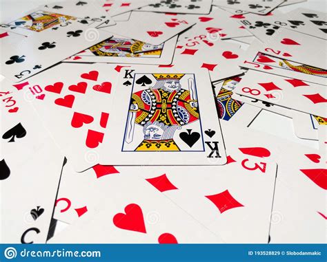 Face cards are those with a king, queen or jack on them. A King Card With A Spade Suit From A Deck Of Playing Cards On A Pile Of Scattered Cards Stock ...