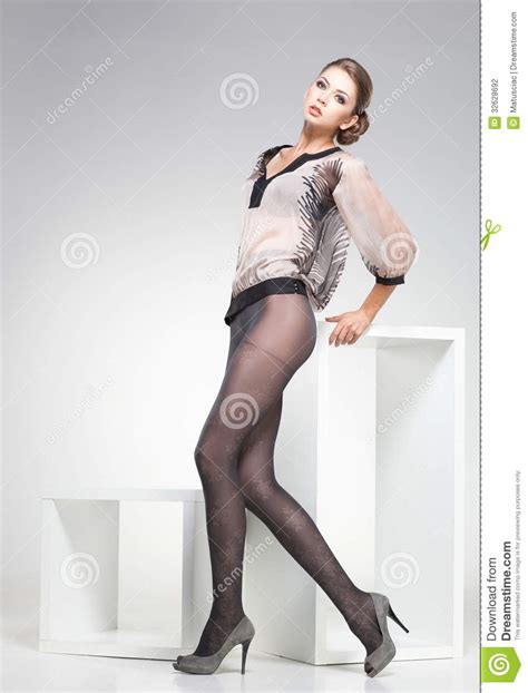 Beautiful Woman With Long Legs Dressed Elegant Posing In