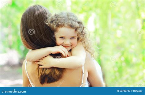 Mother And Daughter Hugging